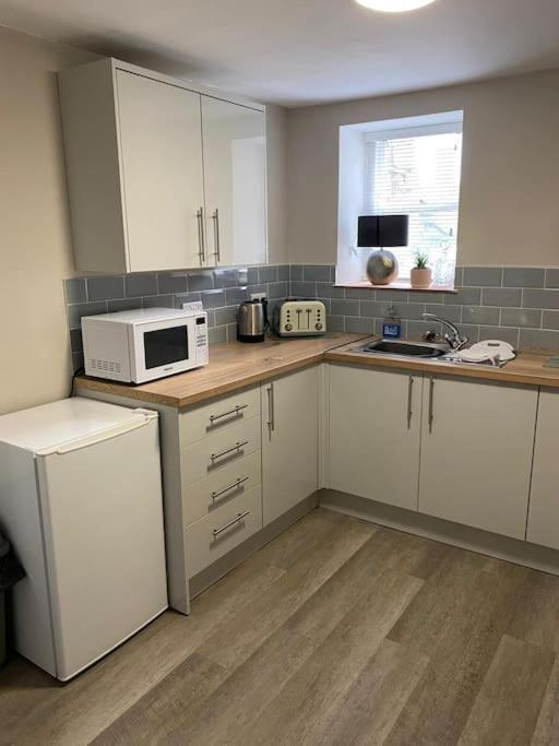 Siop Iwan A Menna Apartamento Caernarfon Exterior foto